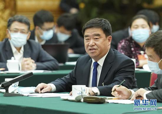 5月22日，全國人大代表薛志國參加內(nèi)蒙古代表團的審議并發(fā)言。新華社記者 黃敬文 攝