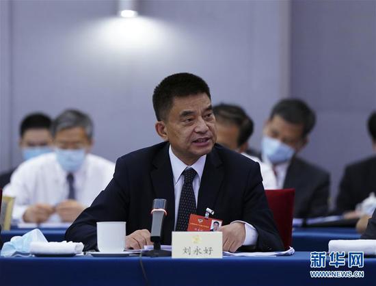  5月23日，全國政協(xié)委員劉永好在政協(xié)聯(lián)組會上發(fā)言。新華社記者 謝環(huán)馳 攝